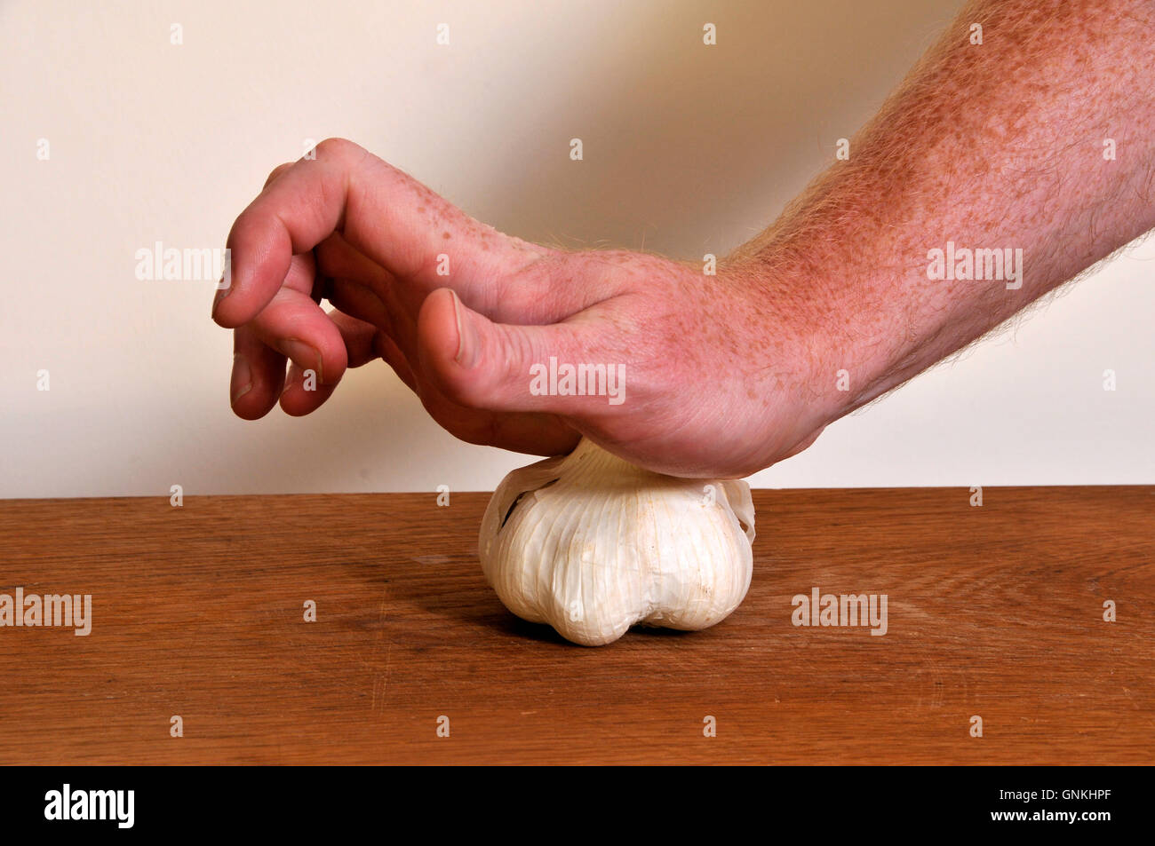 Crushing garlic bulb cooking flavor spice clove chop skin slice smell Stock Photo Alamy