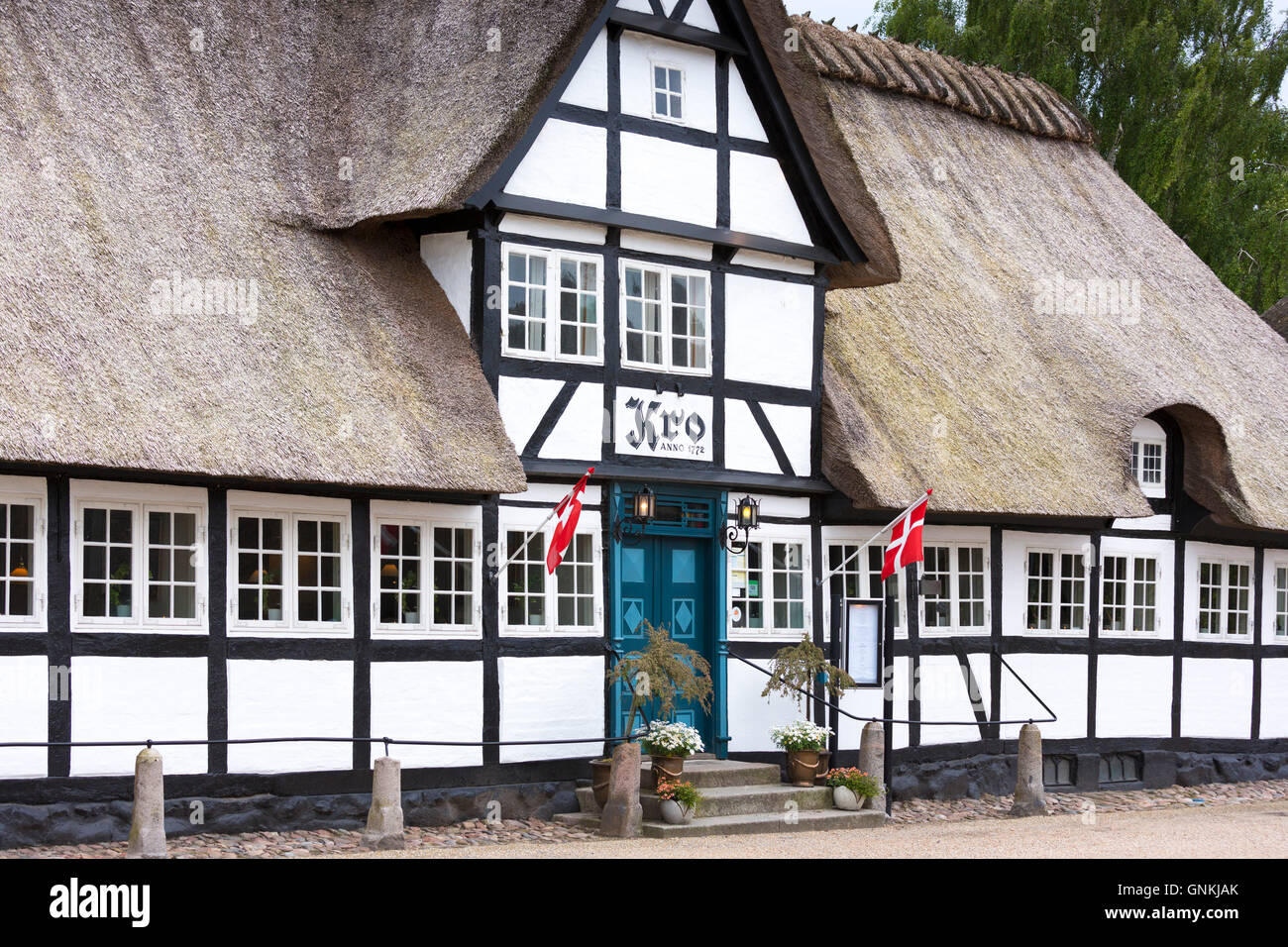 Vester Skerninge Kro, an ancient 18th Century inn half-timbered thatched hotel on Funen, Denmark Stock Photo