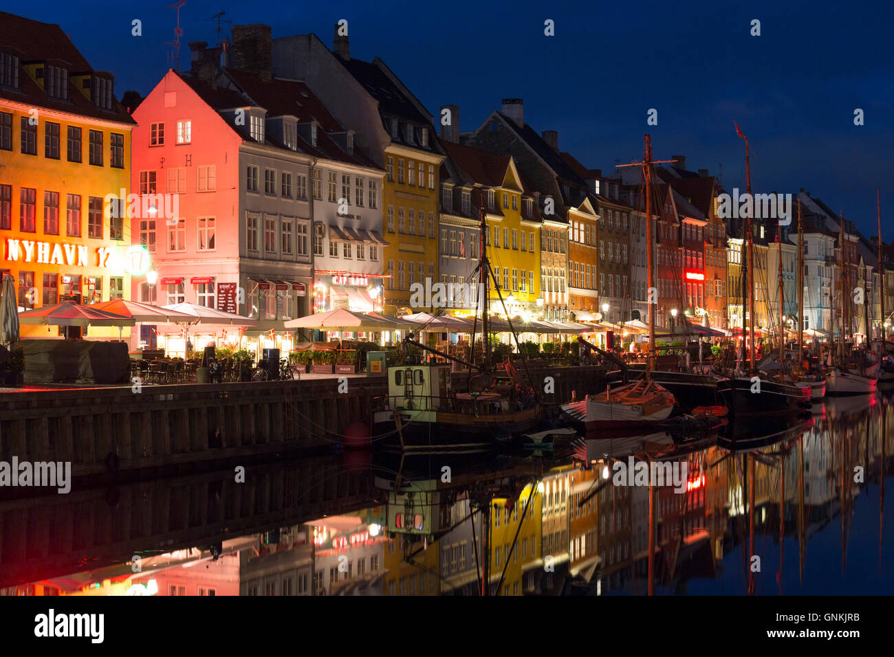 Nightlife in the famous Nyhavn, , old canal harbour in Copenhagen on Zealand, Denmark Stock Photo