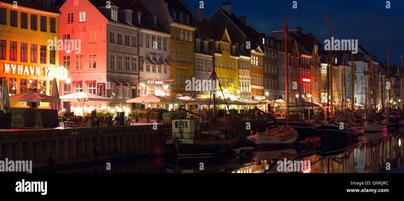 Nightlife in the famous Nyhavn, , old canal harbour in Copenhagen on Zealand, Denmark Stock Photo