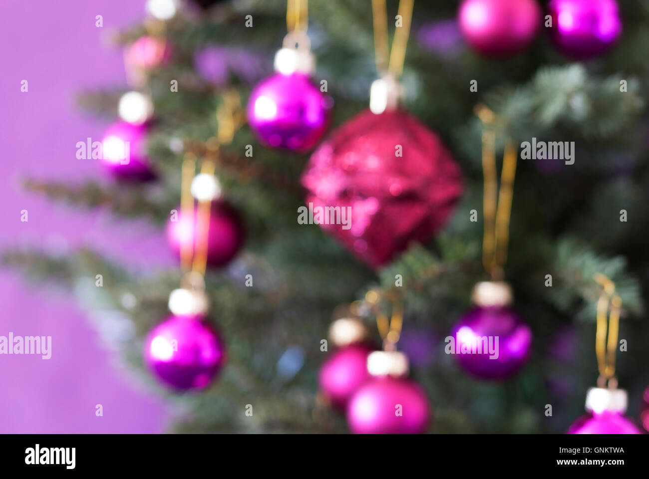 Blurry Christmas Tree And Rose Quartz Balls Stock Photo