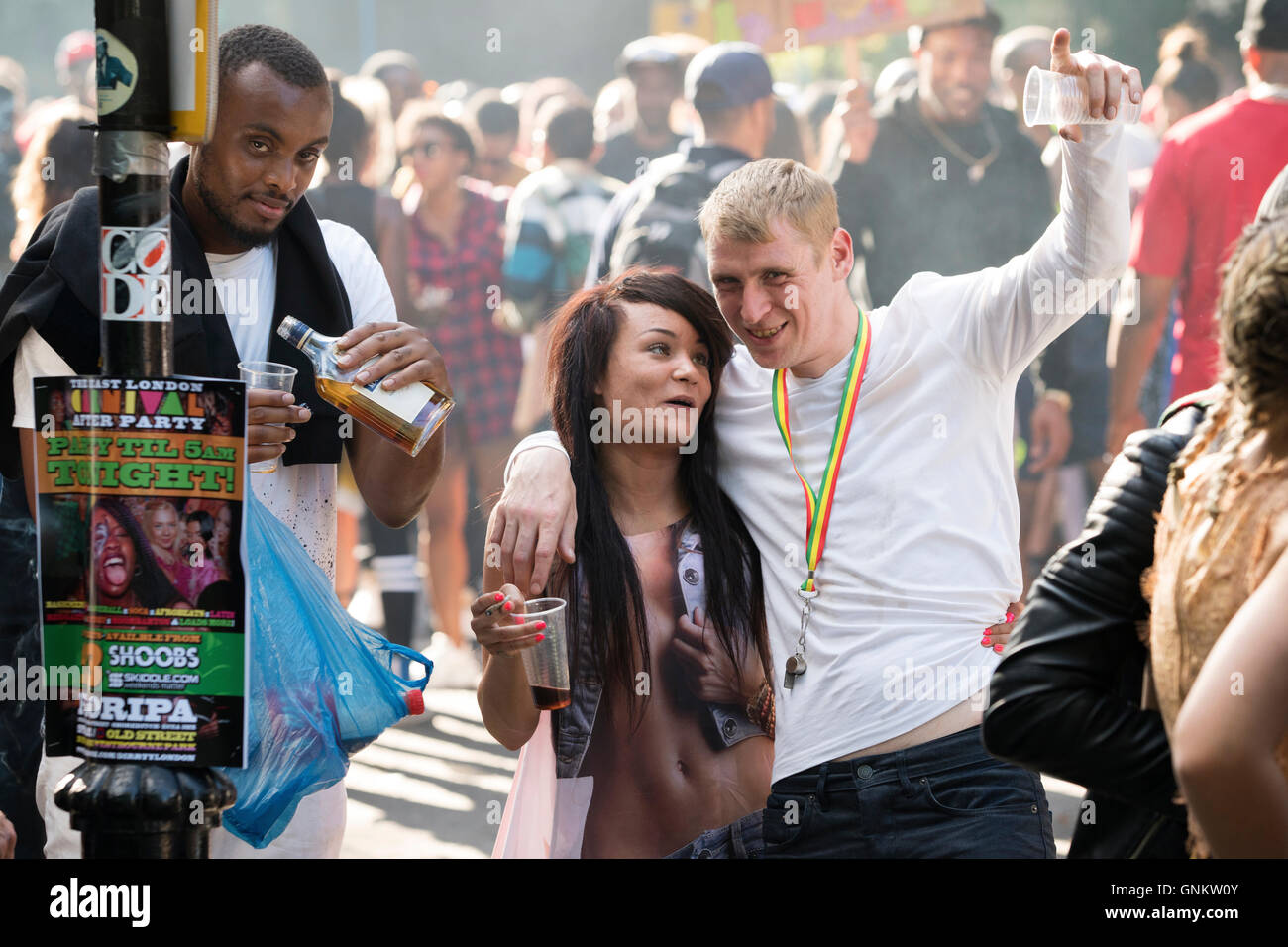 People drinking at The Notting Hill Carnival in London Stock Photo