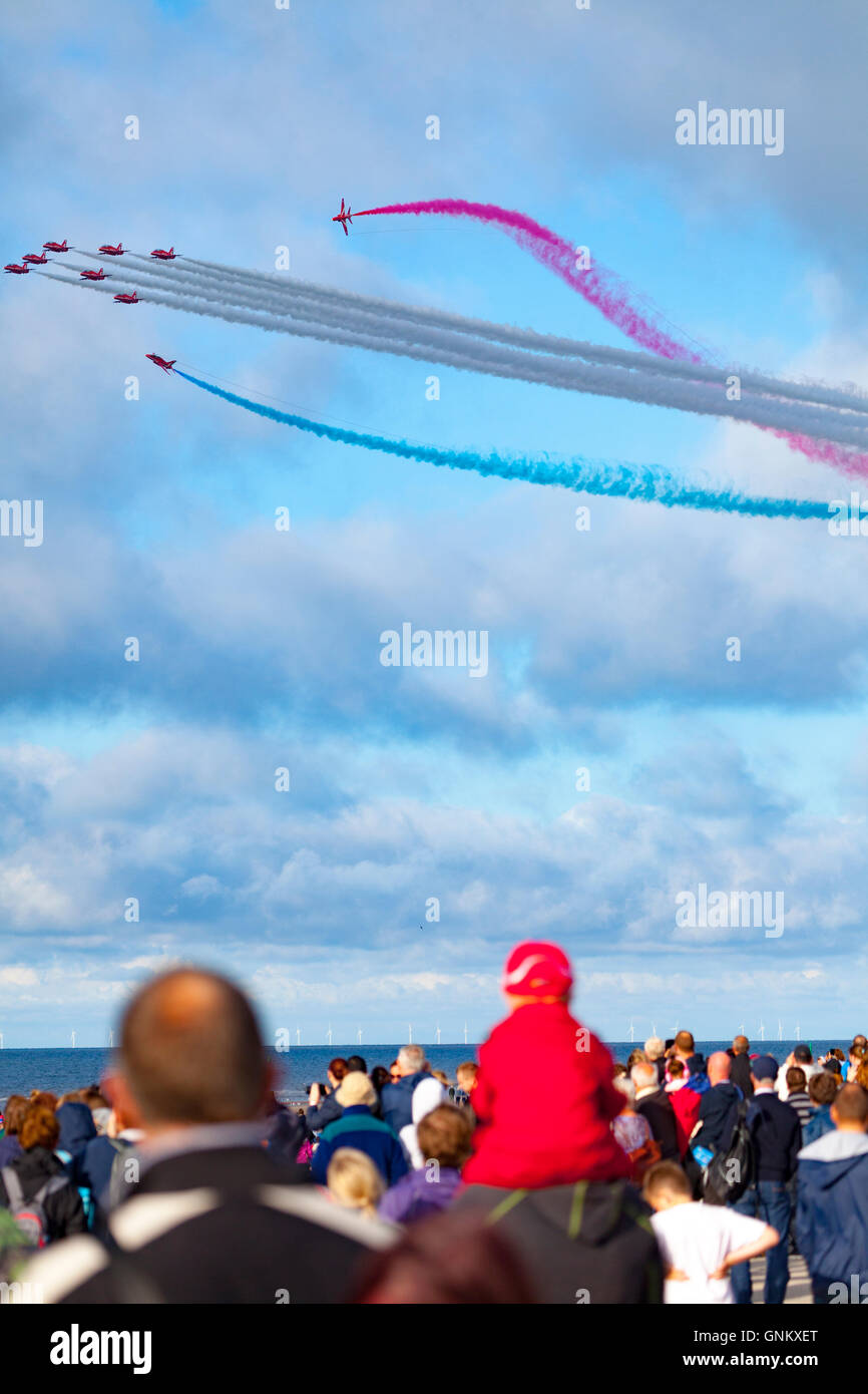 Rhyl Air Show 2016 located on the North Wales coast and held every year. Spectators watch the Red Arrows fly past Stock Photo