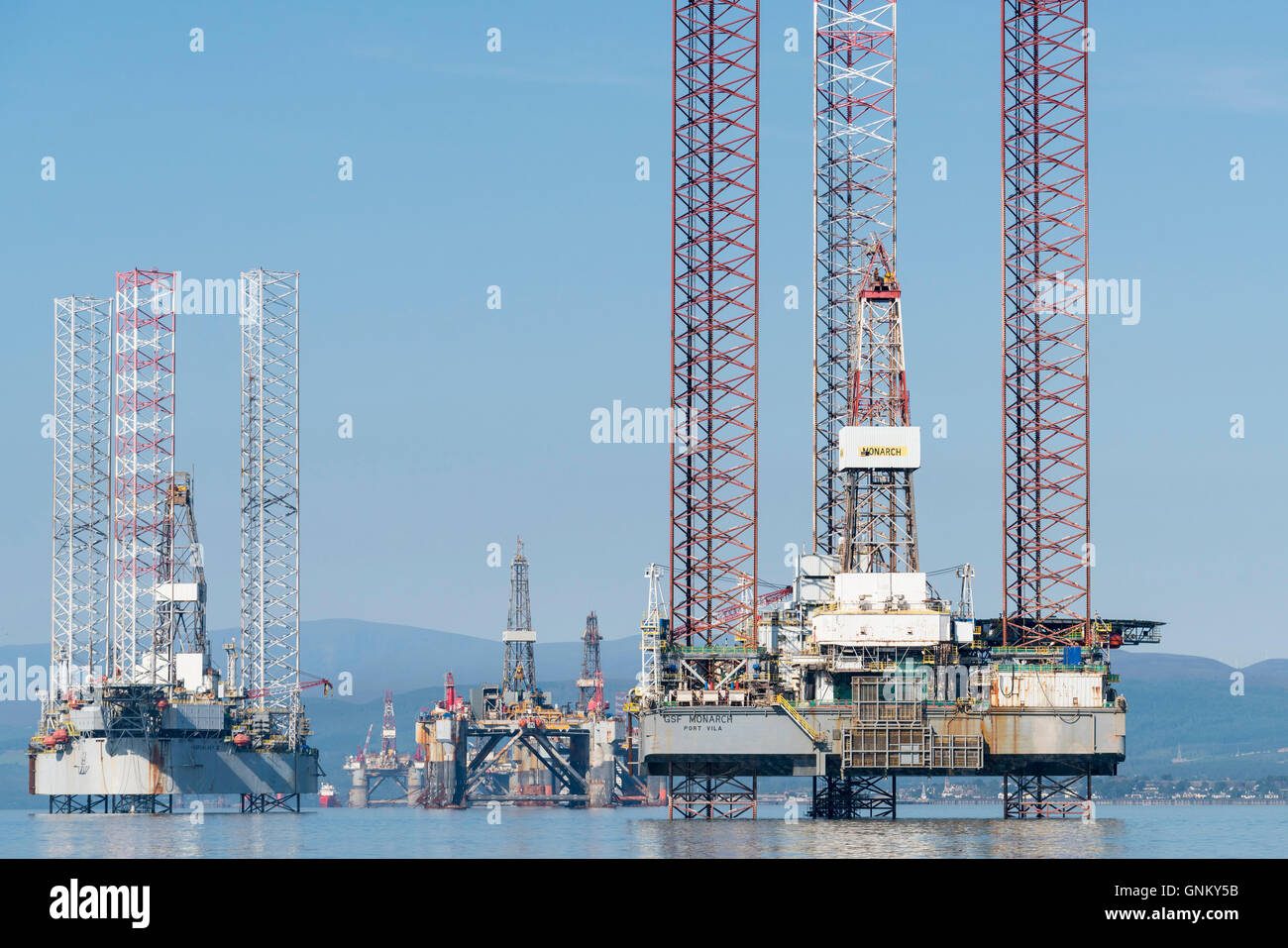 Oil rigs / drilling platforms moored in Cromarty Firth in Ross and Cromarty, Highland, Scotland, United Kingdom Stock Photo
