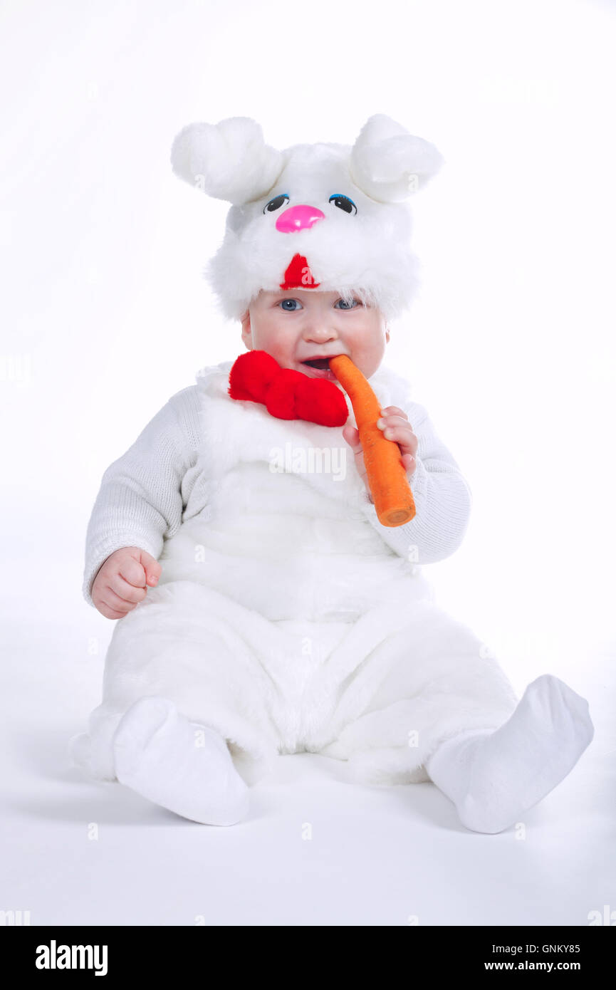 little boy in rabbit costume with carrot isolated Stock Photo - Alamy