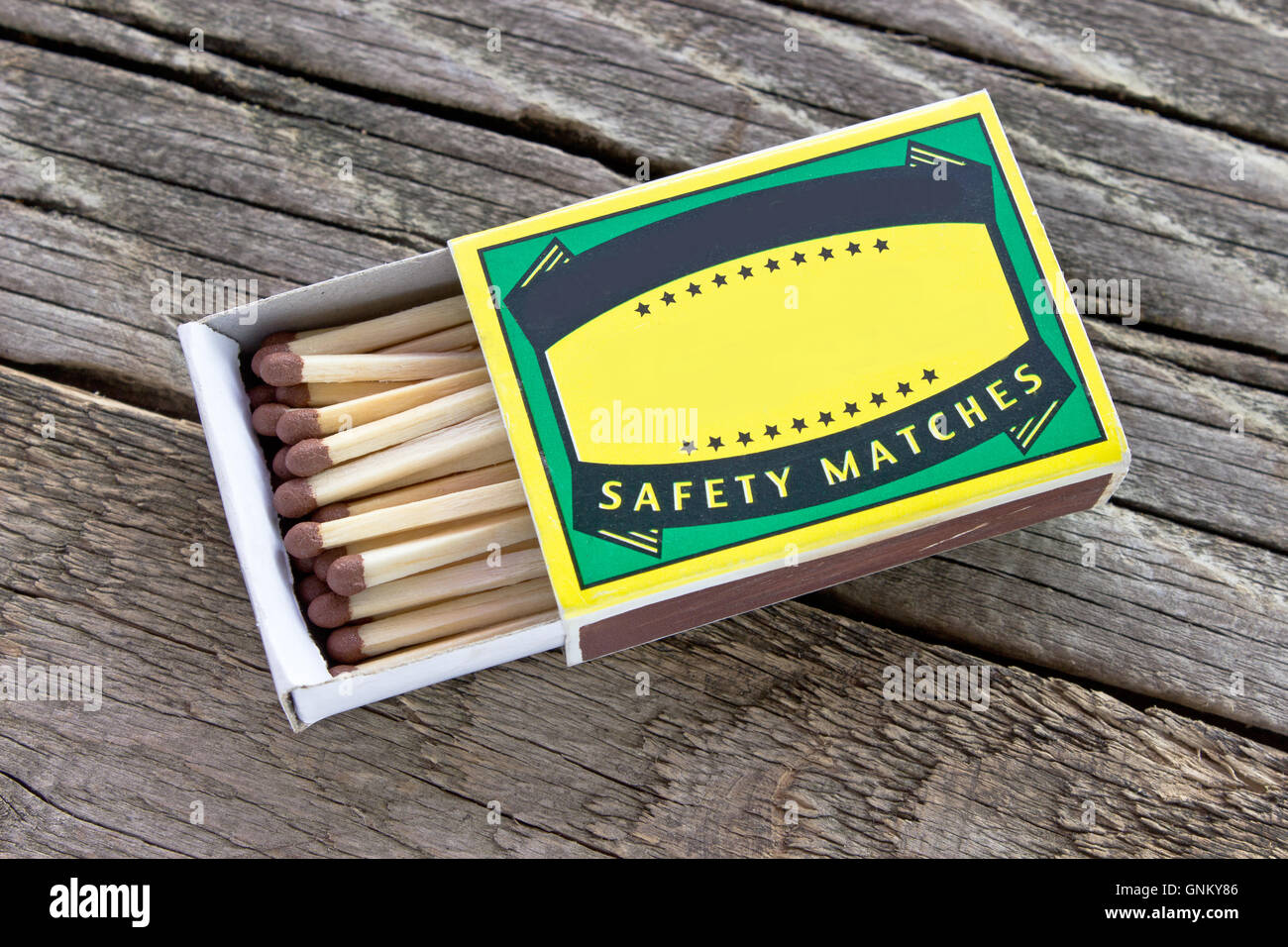 Matches box on wooden background Stock Photo
