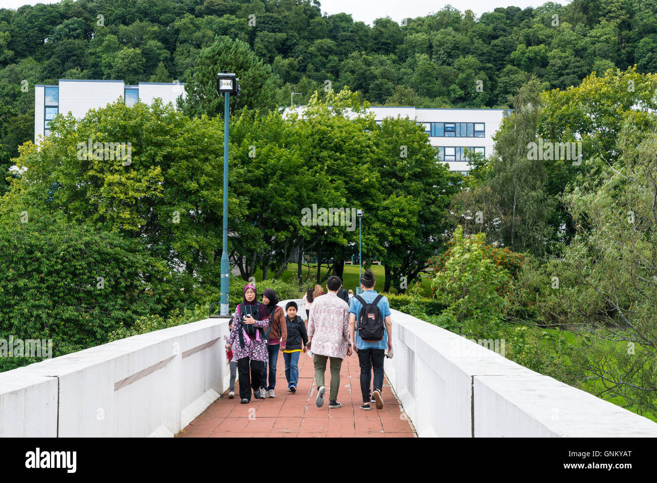 People of footbridge on campus at Stirling University in Scotland , united Kingdom Stock Photo