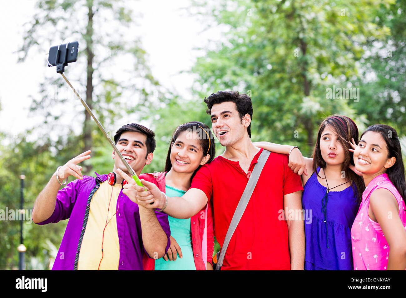 5 Young Girls And Boys Friends College Student Park Holding Selfie Stick Mobile Phone Clicking Selfie Stock Photo Alamy 5 Young Girls And Boys Friends College Student Park Holding Selfie Stick Mobile Phone Clicking Selfie Stock Photo Alamy