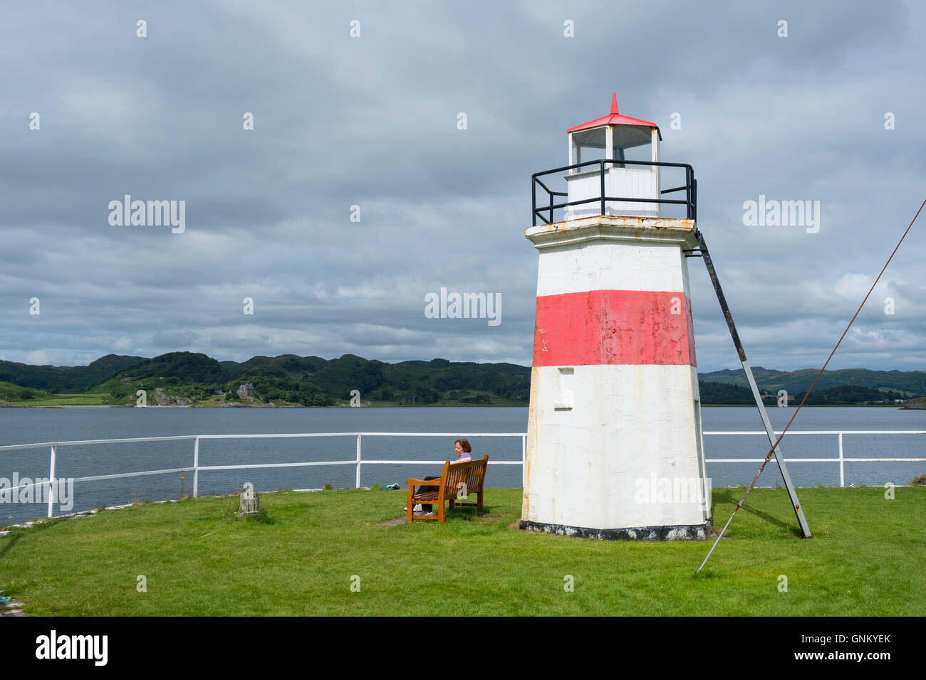 Small lighthouse at end of Crinan Canal at Crinan in Argyll and Bute, Scotland, United Kingdom Stock Photo