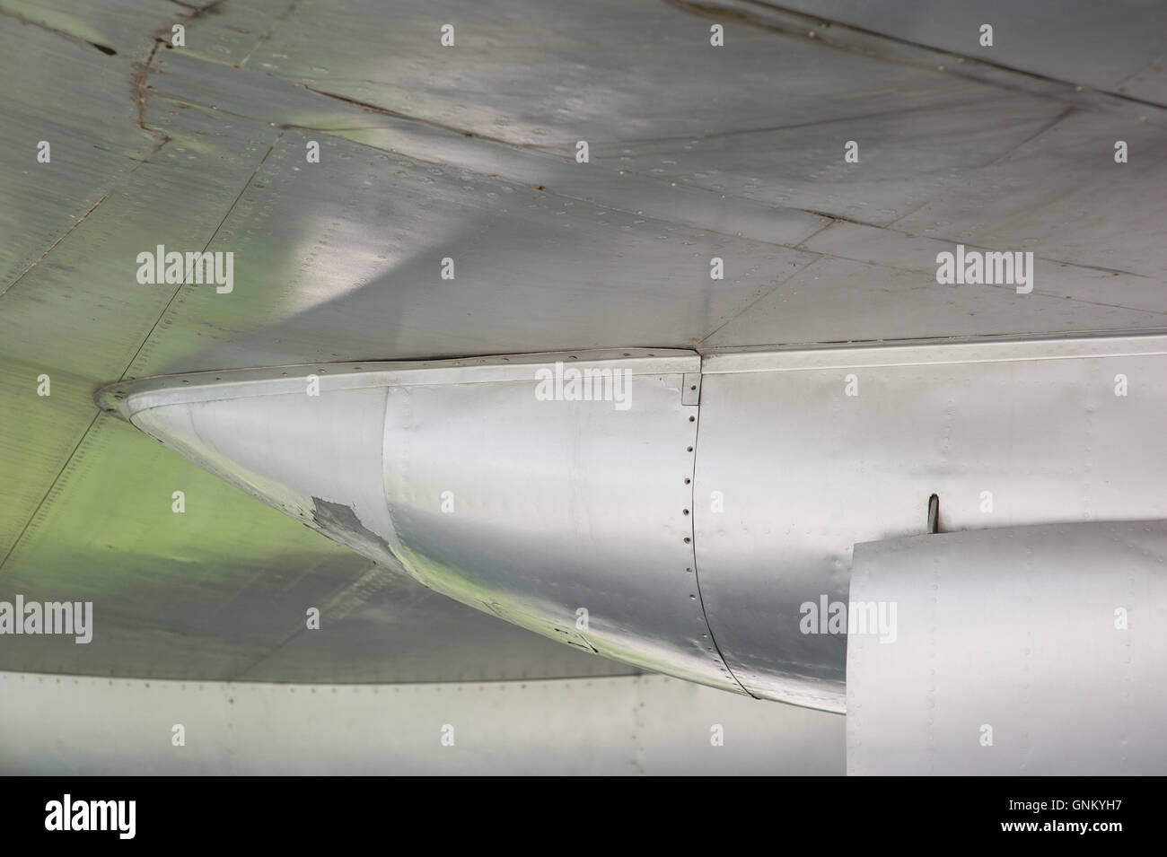 Aluminum fuselage and rivets on old airplane Stock Photo
