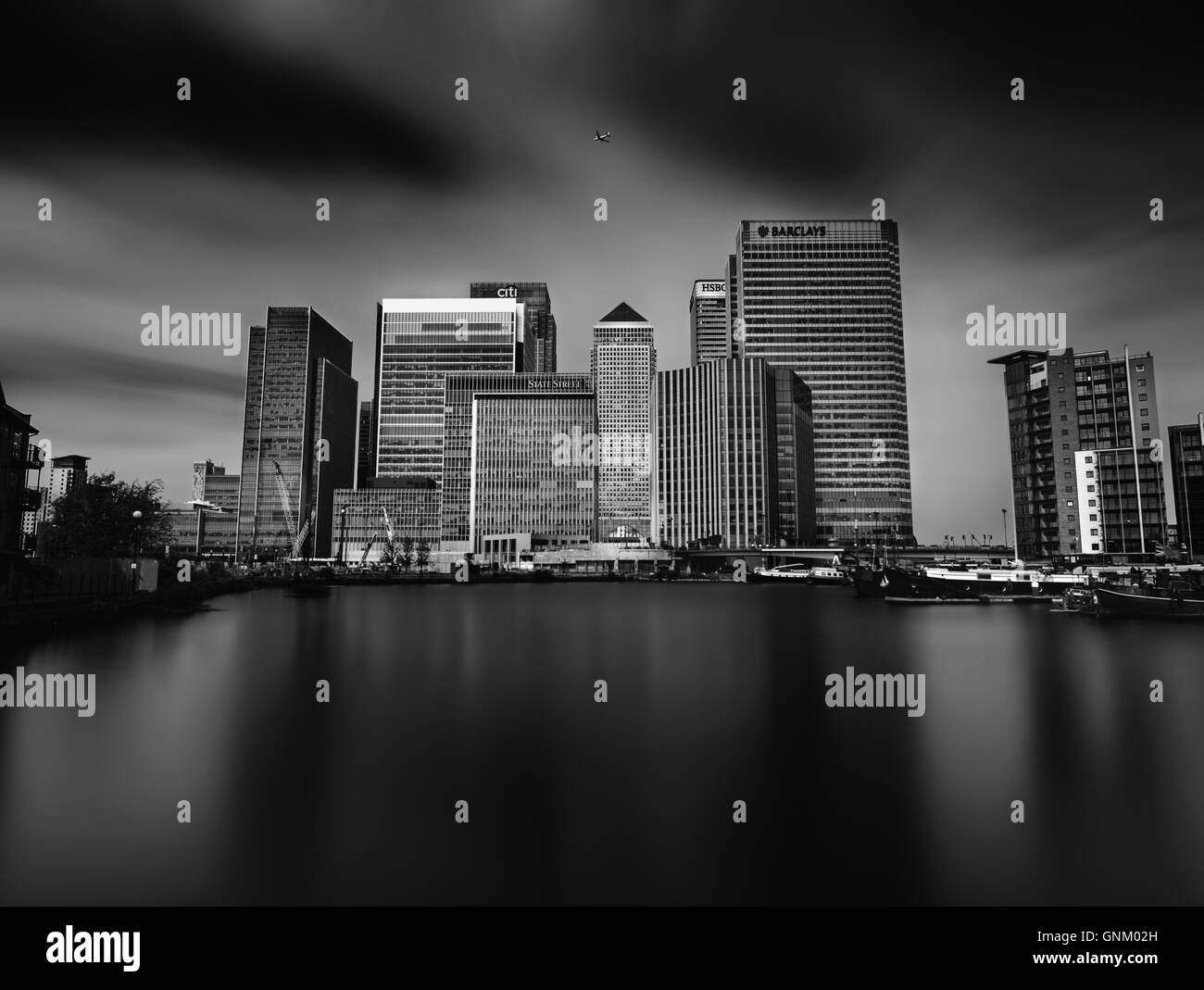 Canary Wharf skyline shot from across the Blackwall Basin. Stock Photo