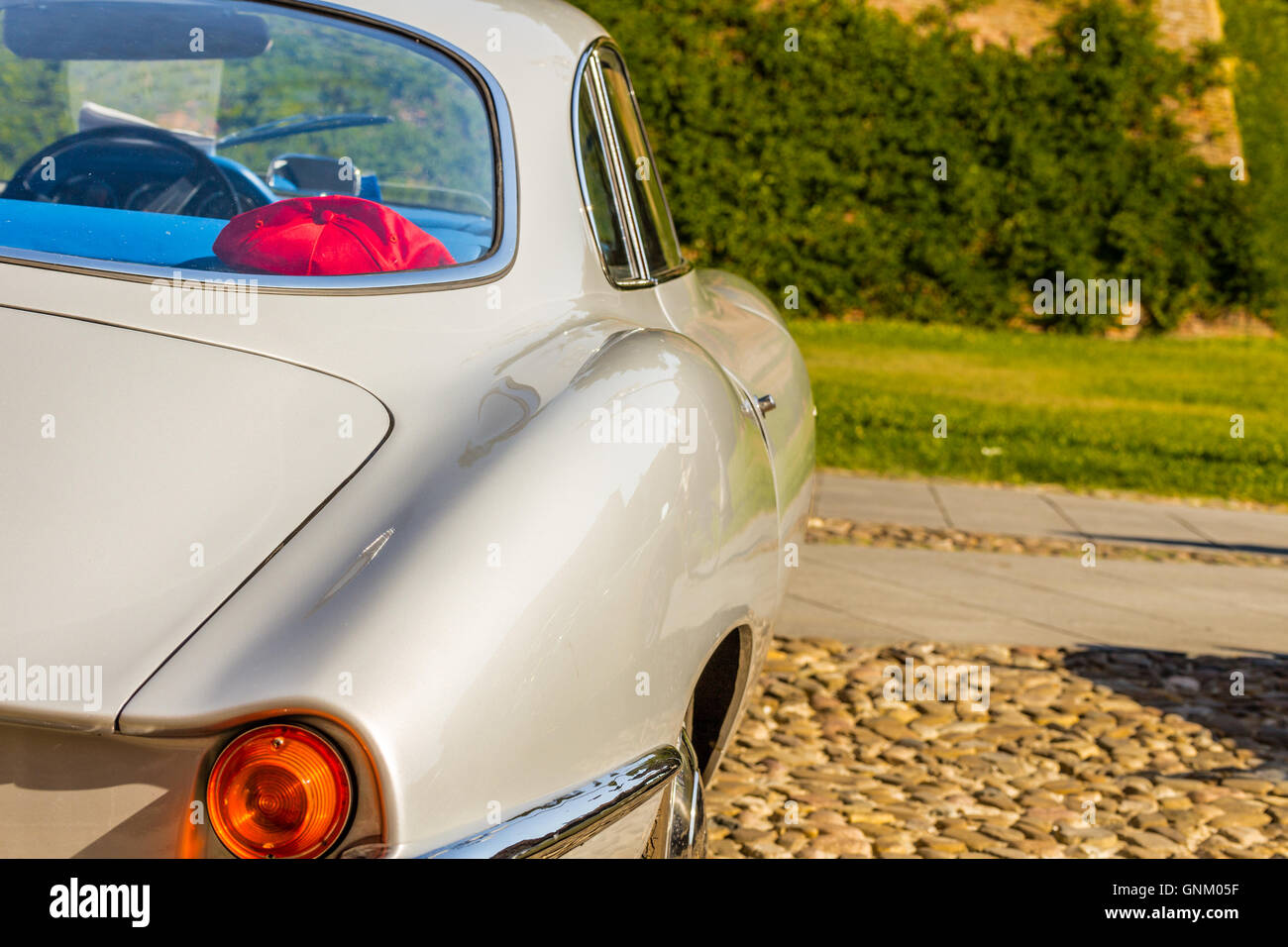 view from behind of the sinuous line of the bodywork of vintage sports car Stock Photo