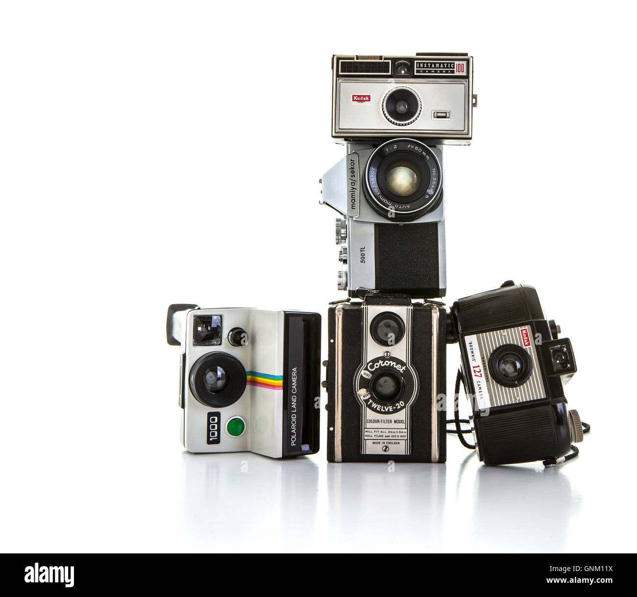 Collection of old cameras on a white background Stock Photo