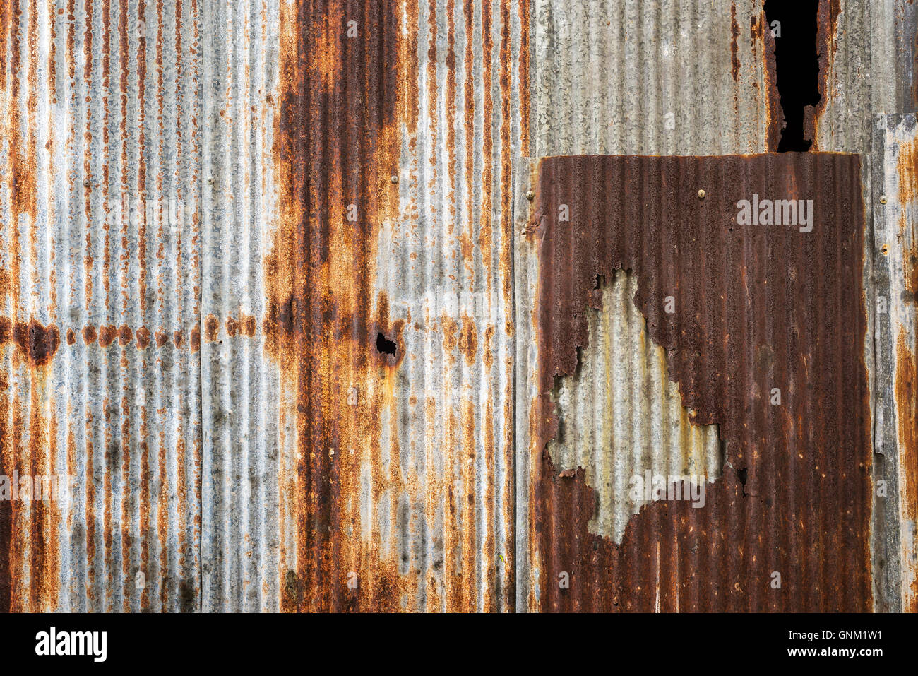Old rusty zinc plat wall. Stock Photo
