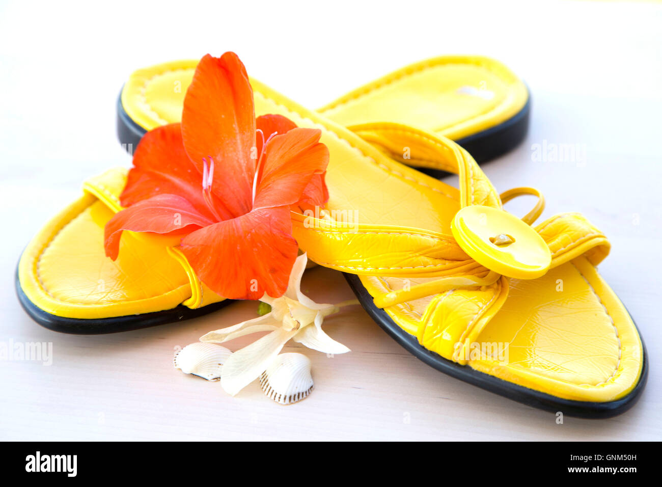 Yellow summer slippers Stock Photo Alamy