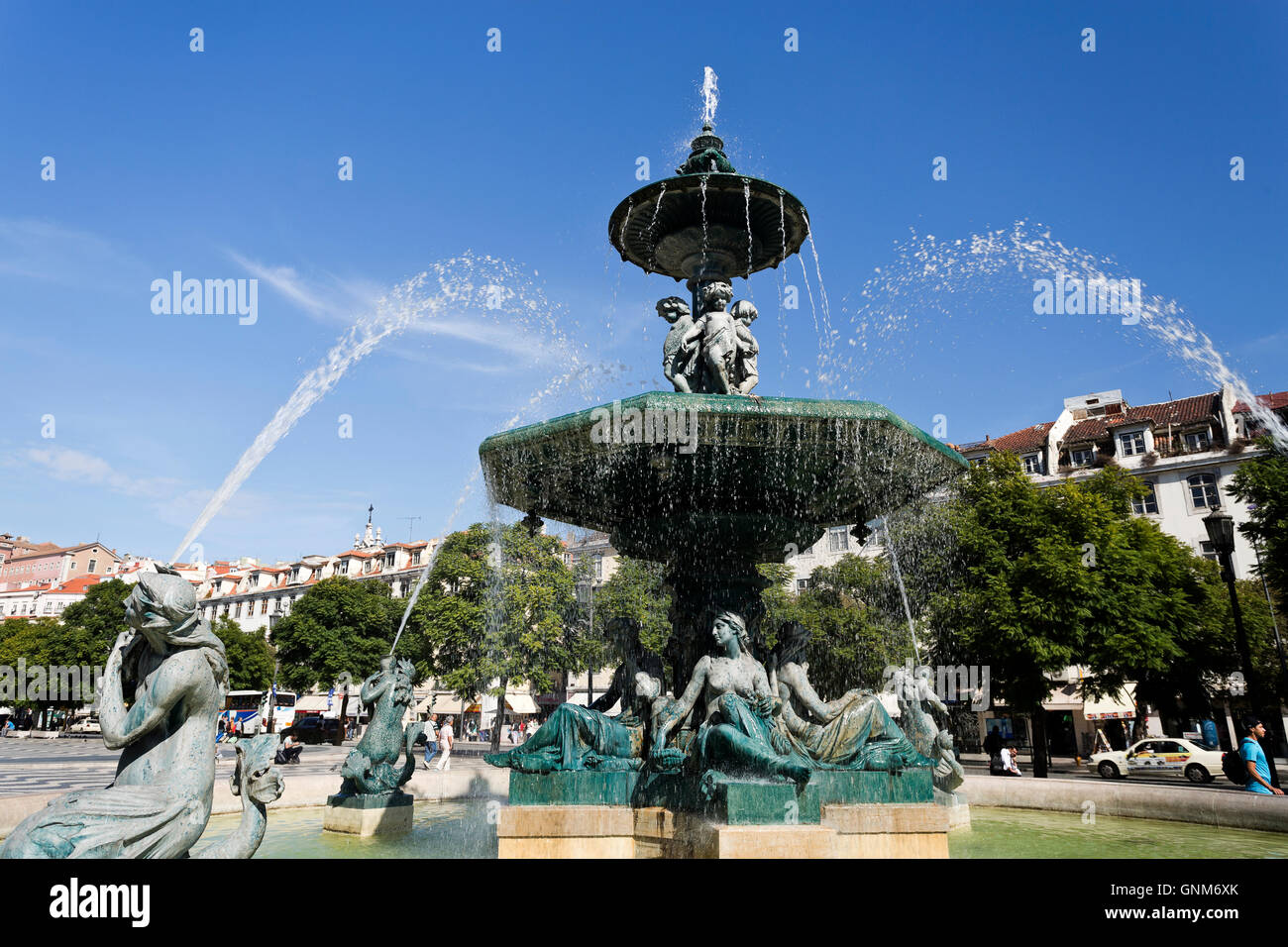 Bronze fountain adorning Rossio Square, located in the Pombaline Downtown and a main square in Lisbon, Portugal Stock Photo