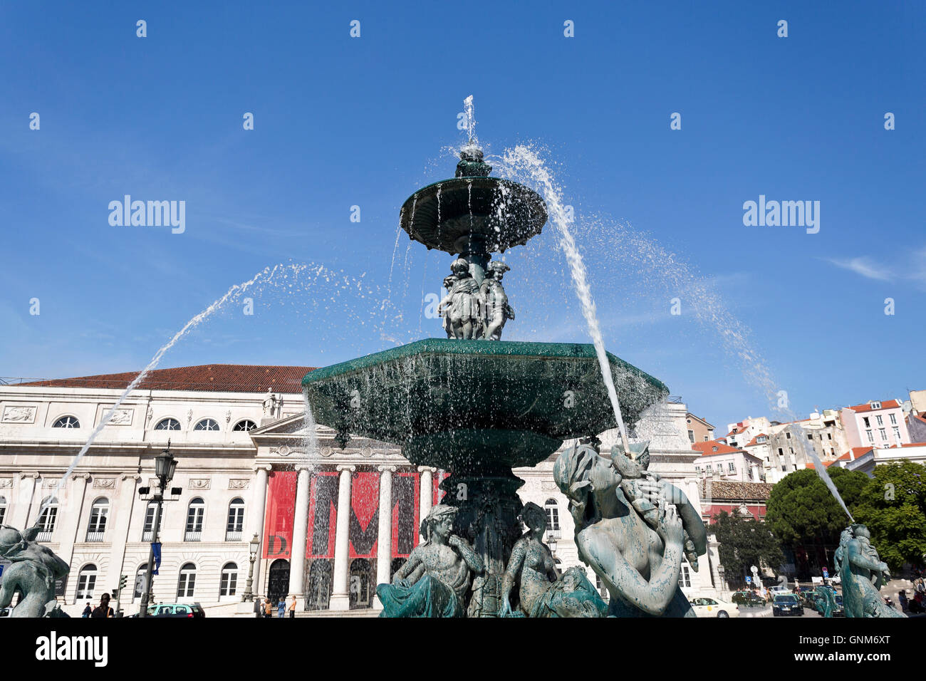 Bronze fountain adorning Rossio Square, located in the Pombaline Downtown and a main square in Lisbon, Portugal Stock Photo