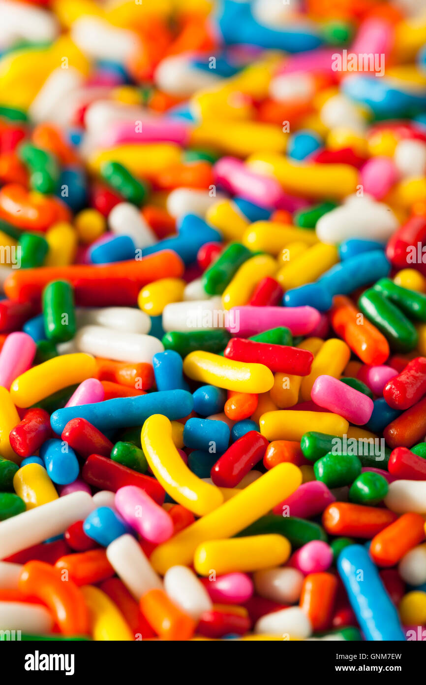 Bright Colored Rainbow Sprinkles in a Bowl Stock Photo