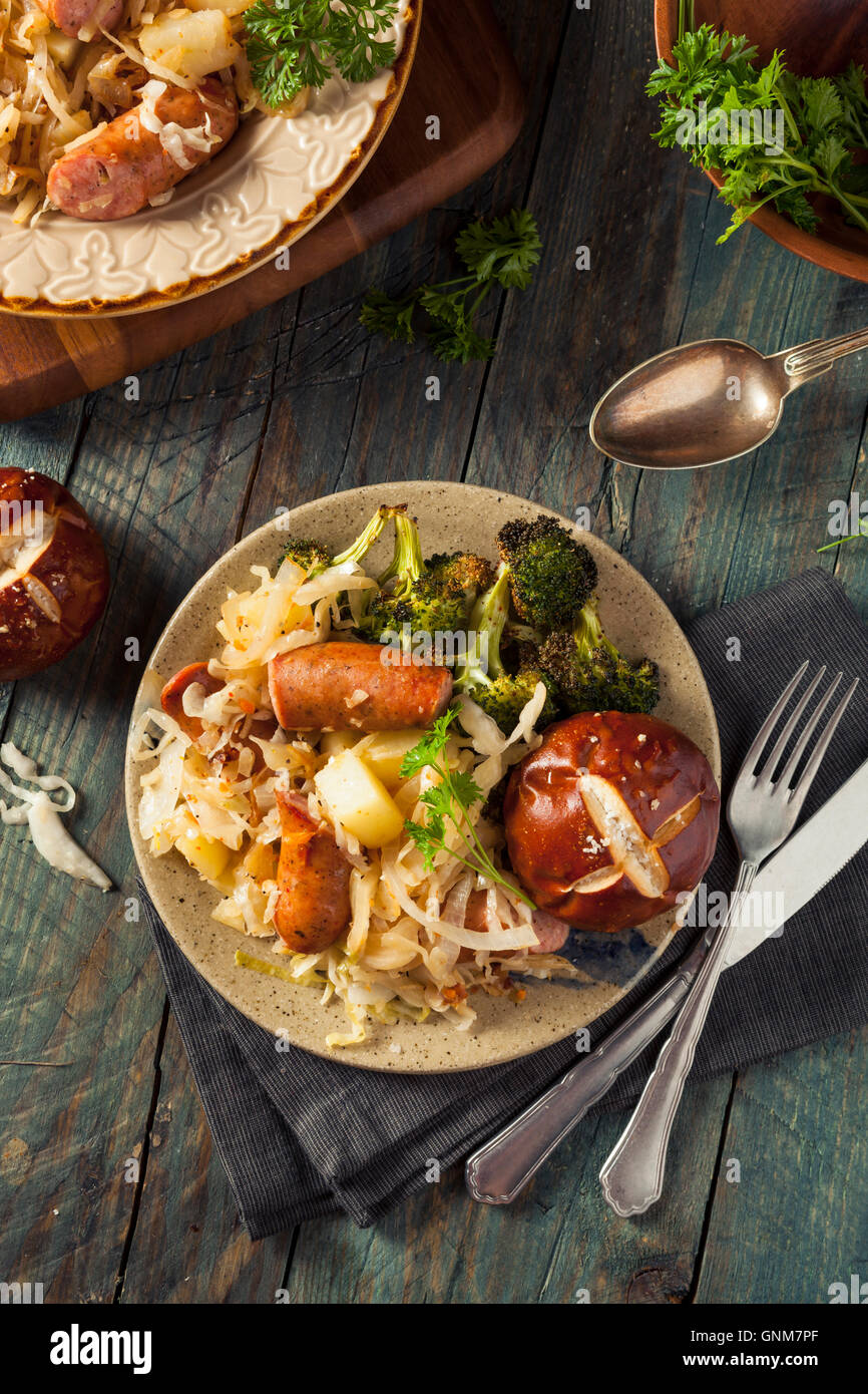 Homemade German Sausage and Sauerkraut with a Pretzel Roll Stock Photo Alamy