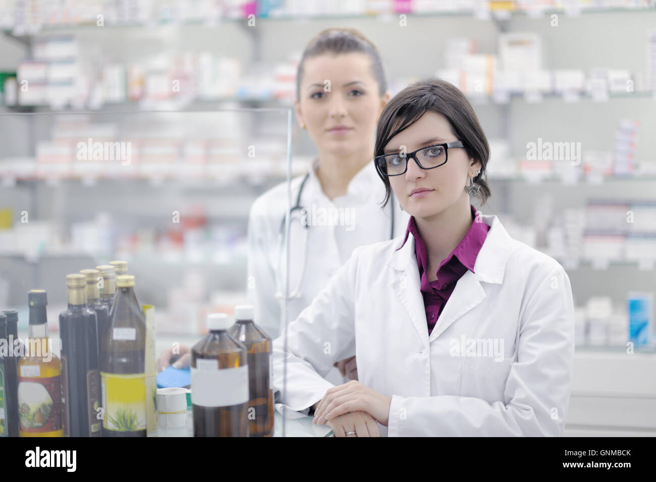 team of pharmacist chemist woman in pharmacy drugstore Stock Photo - Alamy