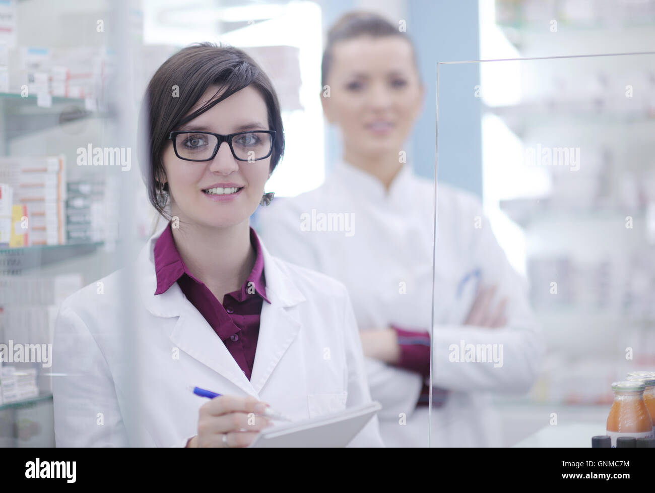 team of pharmacist chemist woman in pharmacy drugstore Stock Photo - Alamy