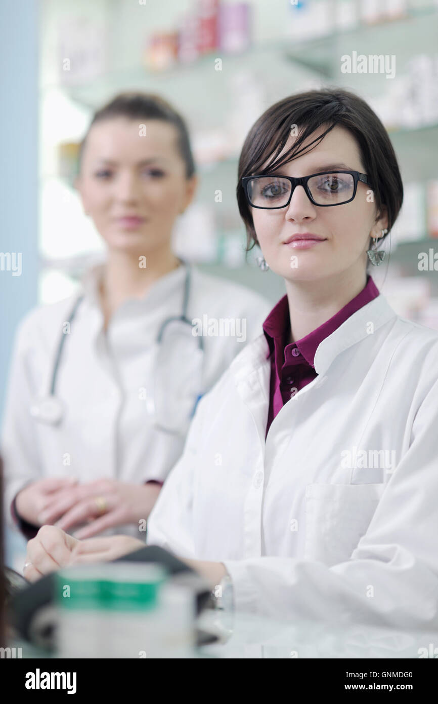 team of pharmacist chemist woman in pharmacy drugstore Stock Photo - Alamy