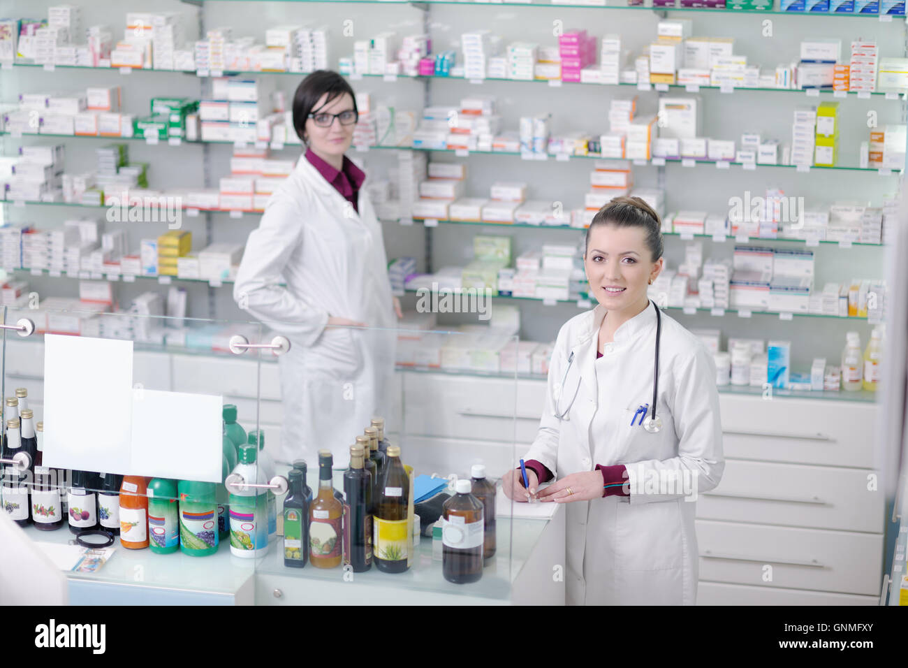 team of pharmacist chemist woman in pharmacy drugstore Stock Photo - Alamy