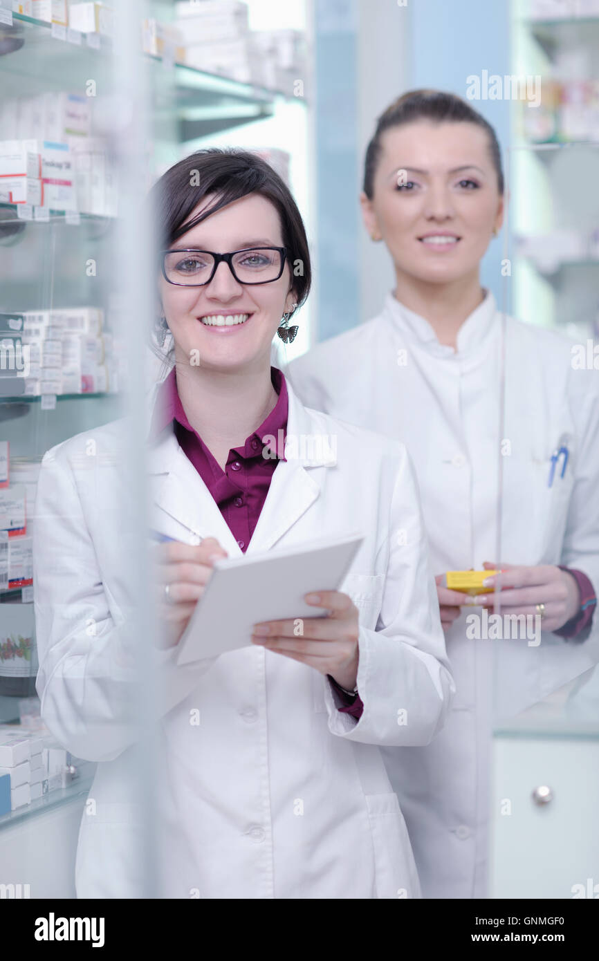 team of pharmacist chemist woman in pharmacy drugstore Stock Photo - Alamy