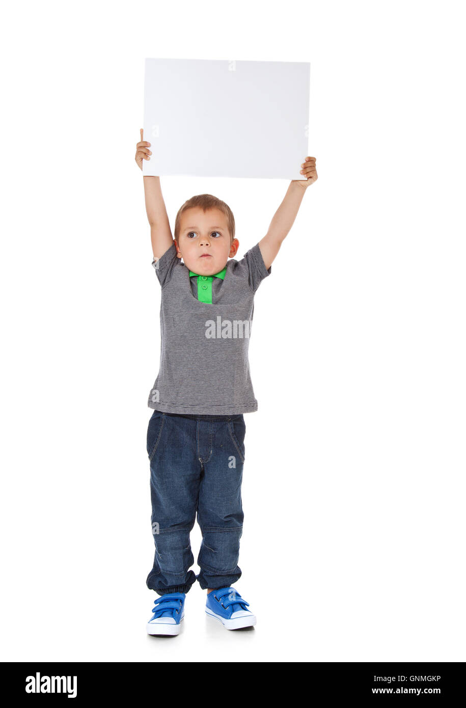 Boy holding blank white sign Stock Photo