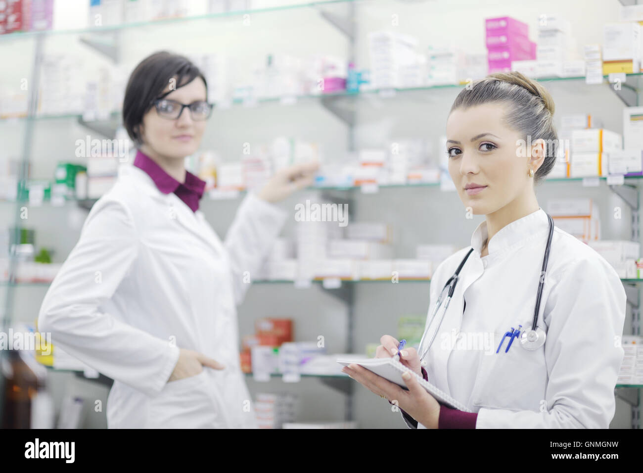 team of pharmacist chemist woman in pharmacy drugstore Stock Photo - Alamy