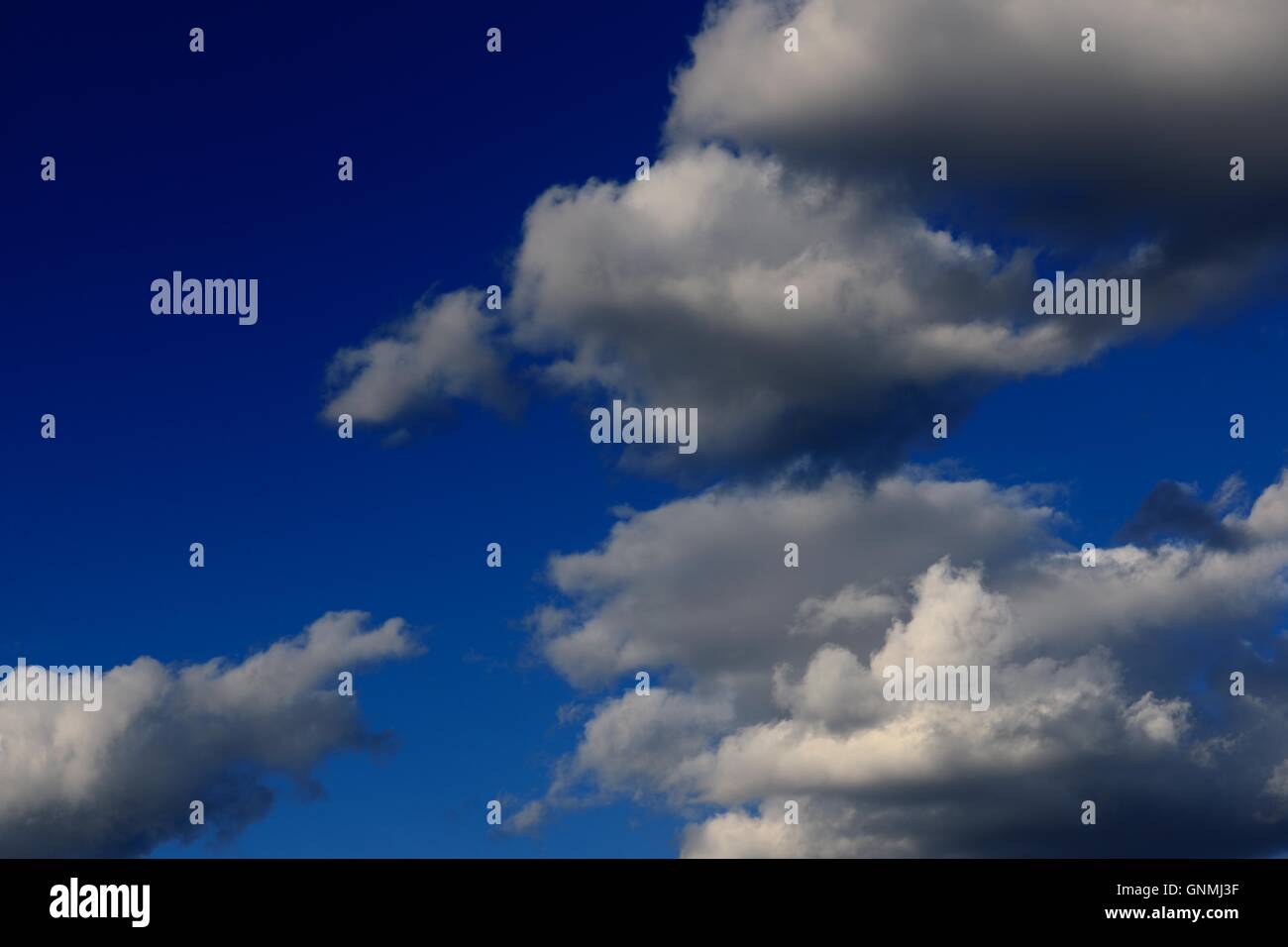 Blue sky with clouds Stock Photo - Alamy