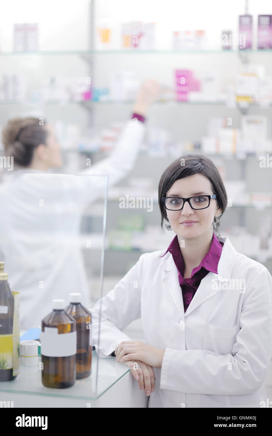 team of pharmacist chemist woman in pharmacy drugstore Stock Photo - Alamy