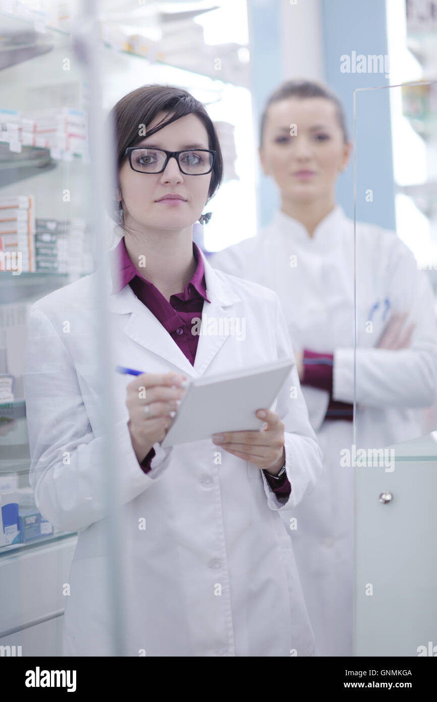 team of pharmacist chemist woman in pharmacy drugstore Stock Photo - Alamy