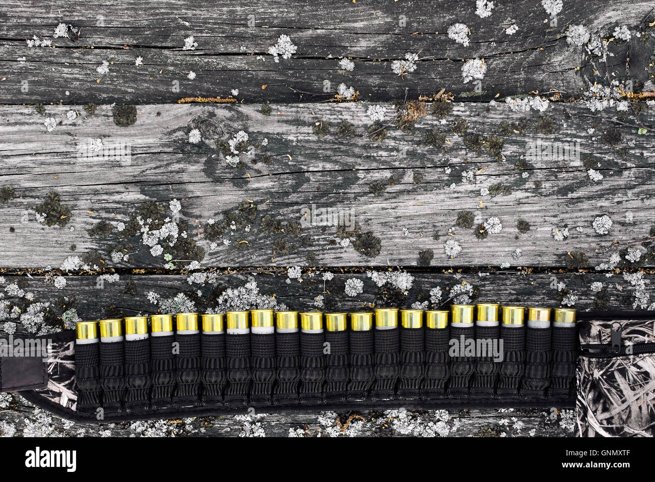 shotgun shells on the wooden table Stock Photo - Alamy