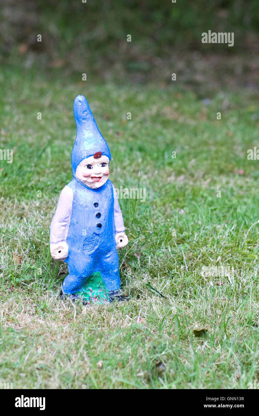 blue old baby garden gnome Stock Photo