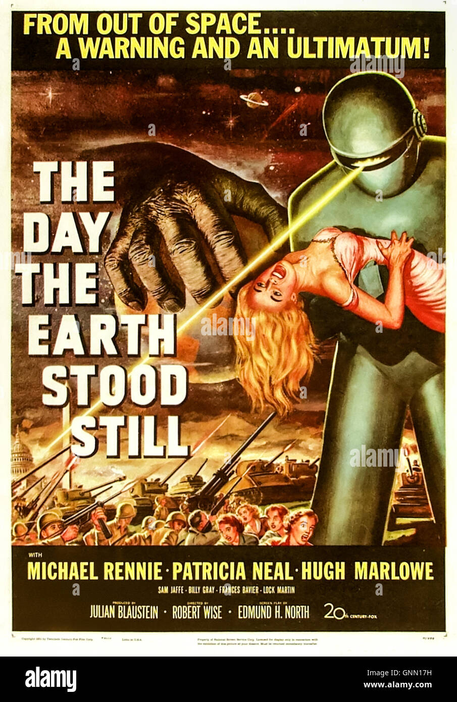 The Day the Earth Stood Still (1951) directed by Robert Wise and starring Michael Rennie, Patricia Neal and Hugh Marlowe.  An alien tells Earth to live in peace and that an intergalactic police force will be watching, Klaatu barada nikto! See description for more information. Stock Photo