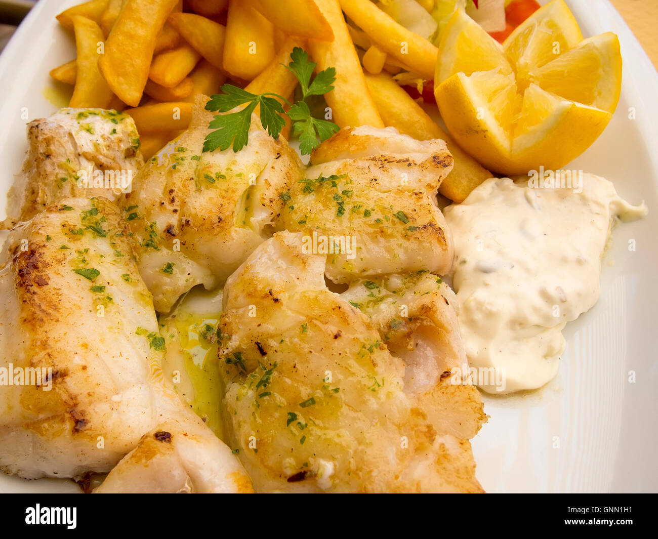 Grilled fish with chips and mayonnaise Stock Photo Alamy
