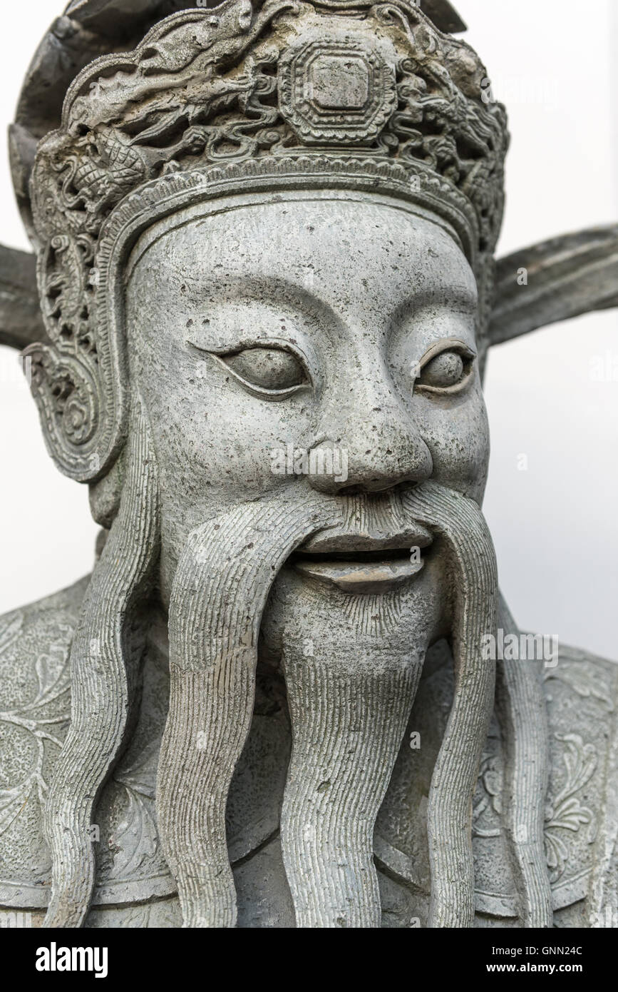 Chinese warrior guardian statue at Wat Pho Buddhist temple in Bangkok