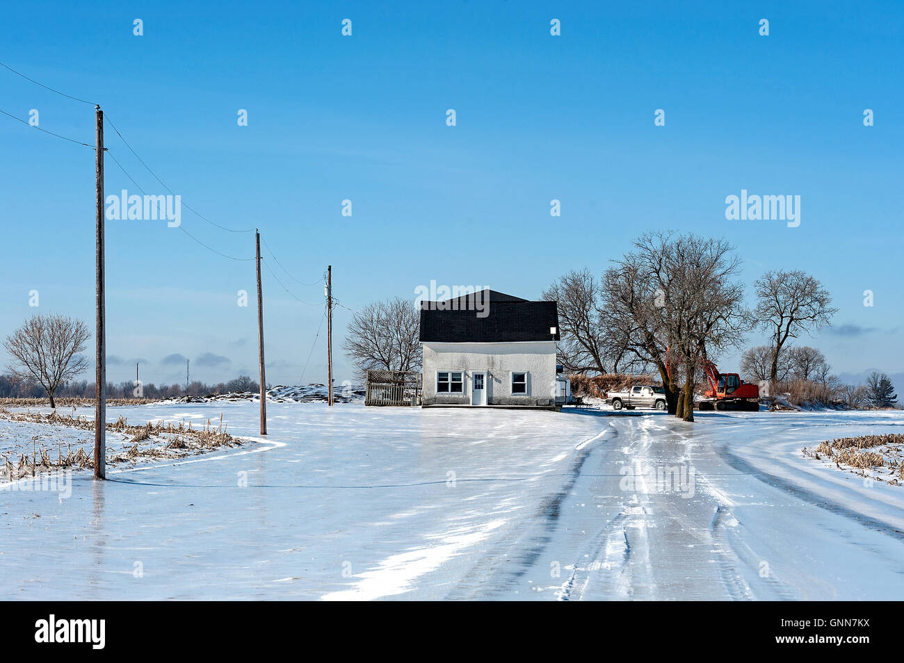 White farm house in winter Stock Photo
