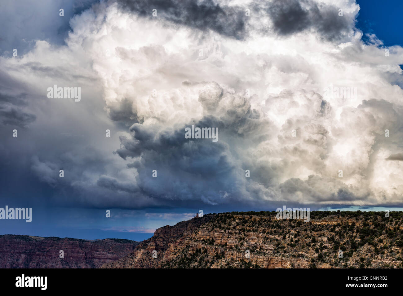 Towering storm over Desert View Watchtower at Grand Canyon National Park Stock Photo