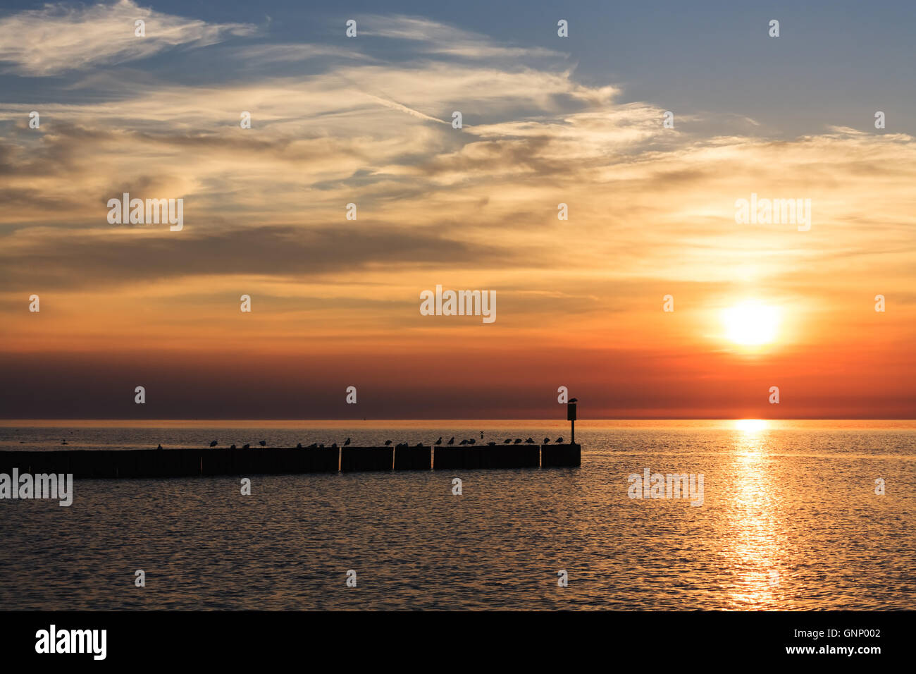 The colors of the sunset over the Baltic Sea Stock Photo - Alamy