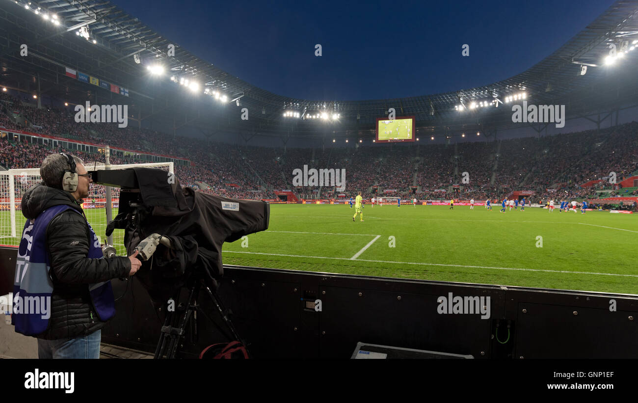 WROCLAW, POLAND - MARCH 26, 2016: View of the full stadium behind the TV media broadcasting during match Stock Photo