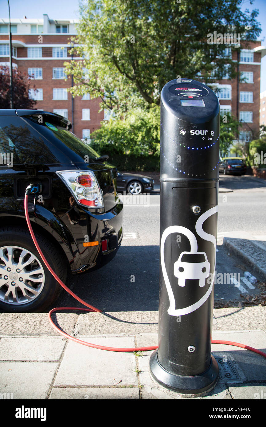 A BYD electric car charging on the roadside at the launch of the first