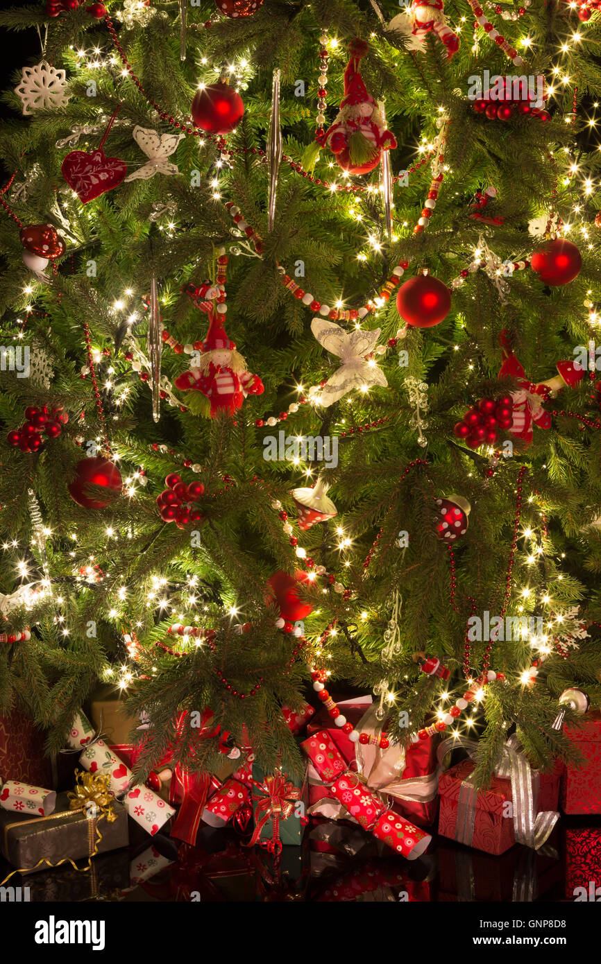 Presents under a decorated christmas tree at home Stock Photo Alamy