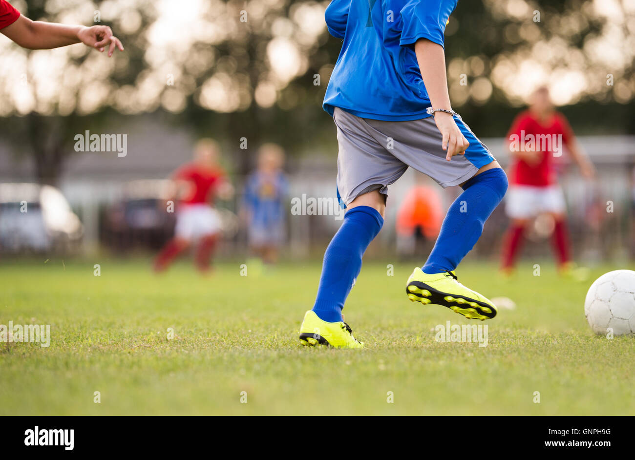 Kicking soccer ball hires stock photography and images Alamy