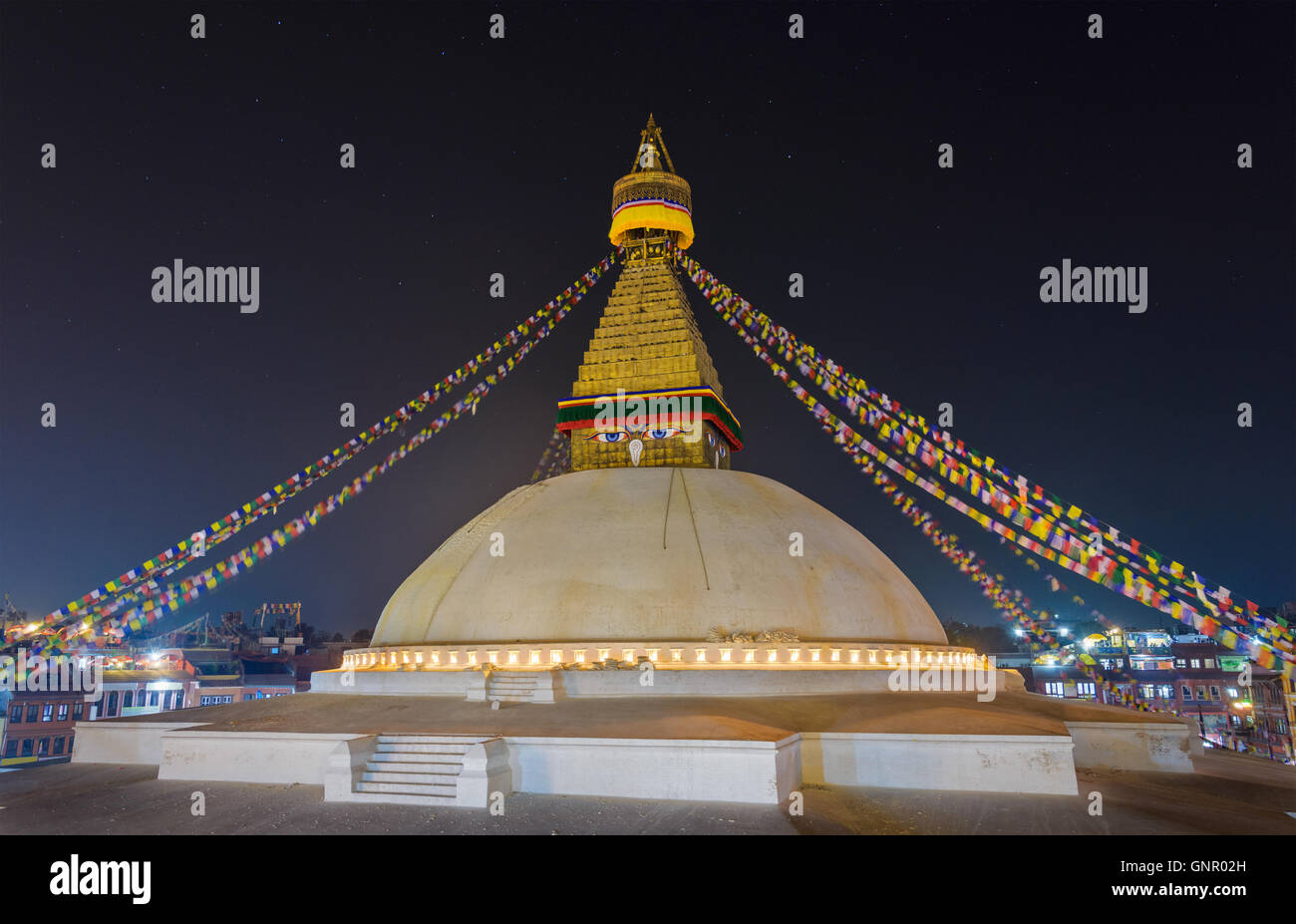 Boudhanath stupa at night in Kathmandu, Nepal Stock Photo