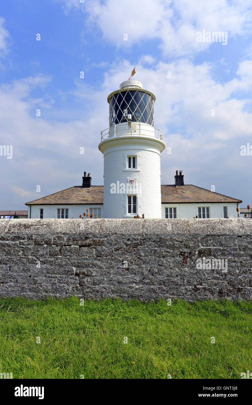 St Bees Head lighthouse on the Coast to Coast Walk, Cumbria, England, UK. Stock Photo