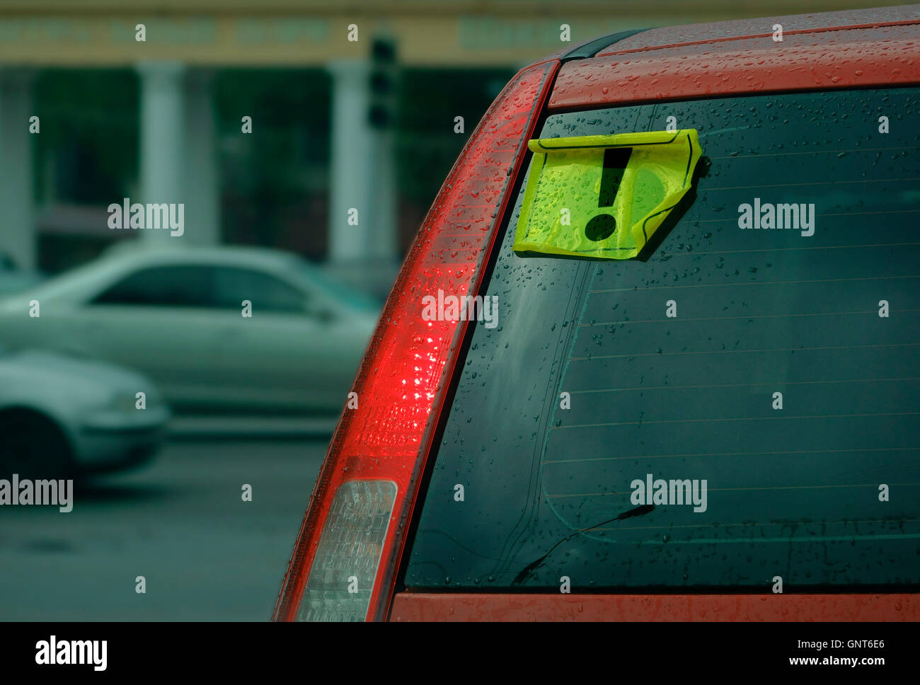 A car with an inexperienced driver Stock Photo