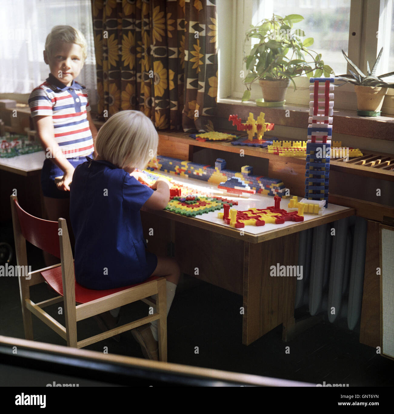 Eisenach, East Germany, Kindergarten children playing with bricks pebe
