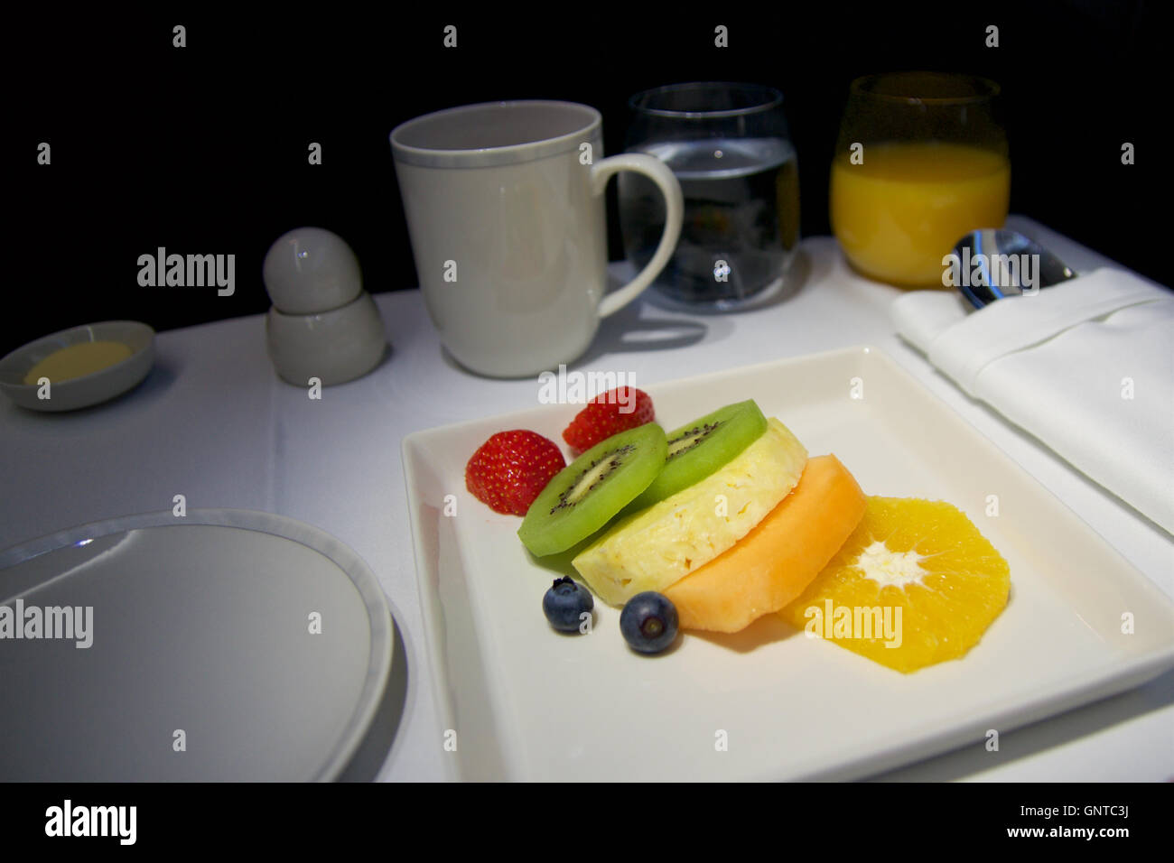 SINGAPORE JULY 22, 2016 breakfast on an airplane in Business Class